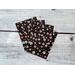 Black envelopes with cherry blossom patterns